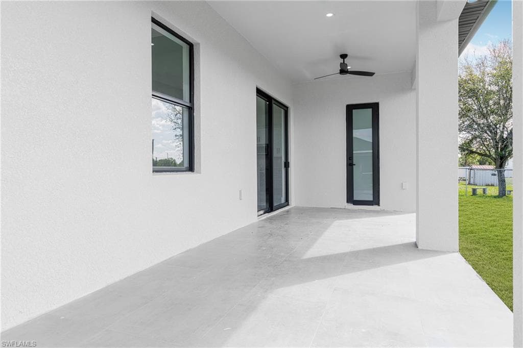 View of patio with ceiling fan