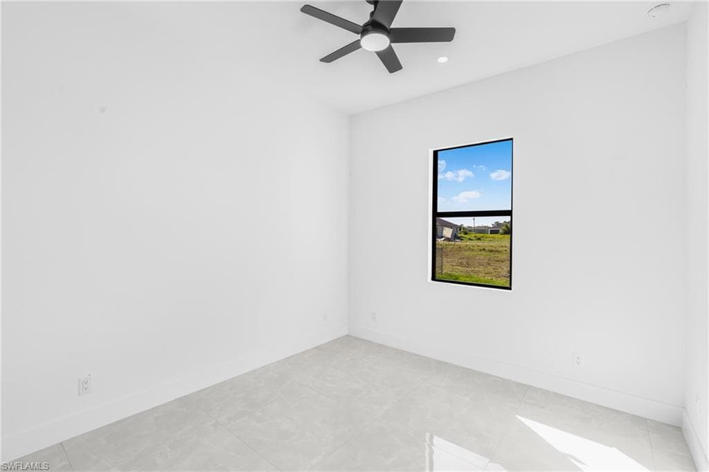 Unfurnished room featuring ceiling fan and recessed lighting