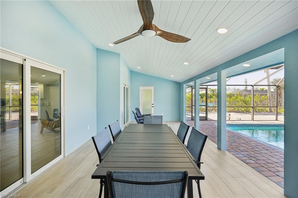 Dining space featuring recessed lighting, light wood-type flooring, a sunroom, ceiling fan, and wooden ceiling