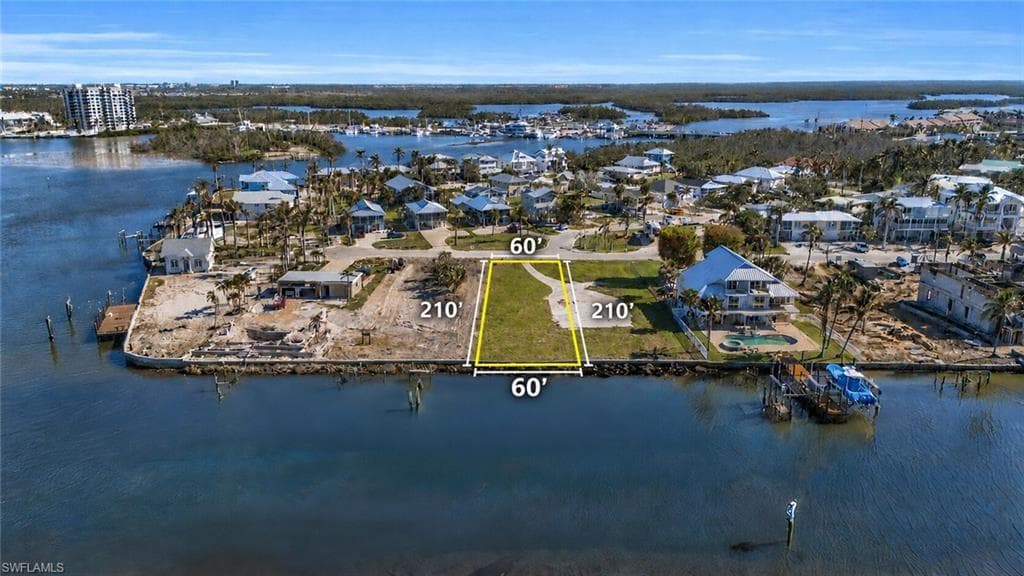 Waterfront parcel featuring 60' of water frontage and 210' of depth- Virtually Edited Image