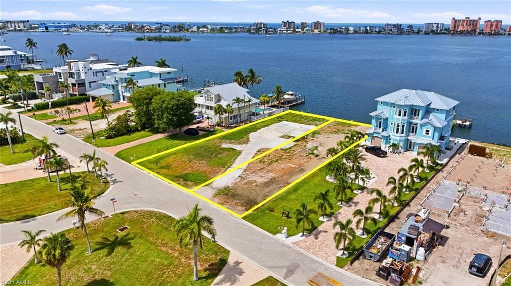 Expansive waterfront lot featuring direct water access - Virtually Edited Image
