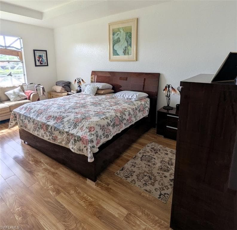 Bedroom featuring wood finished floors