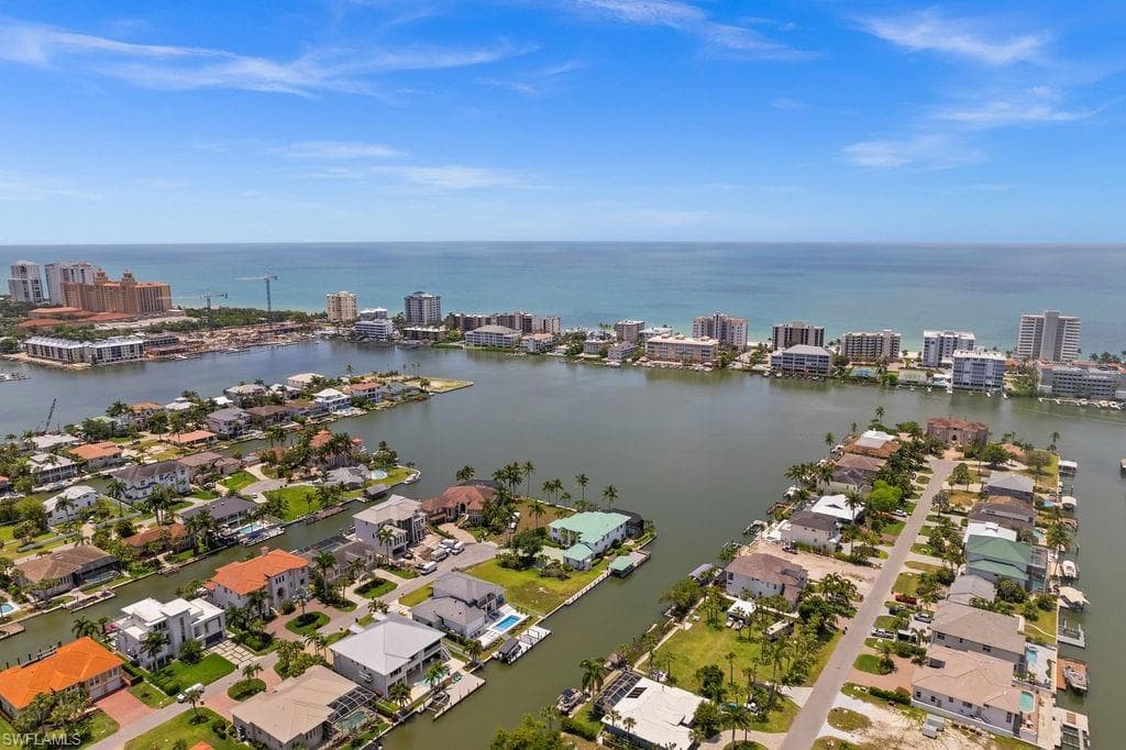 Aerial view of the home with expansive bay and gulf views