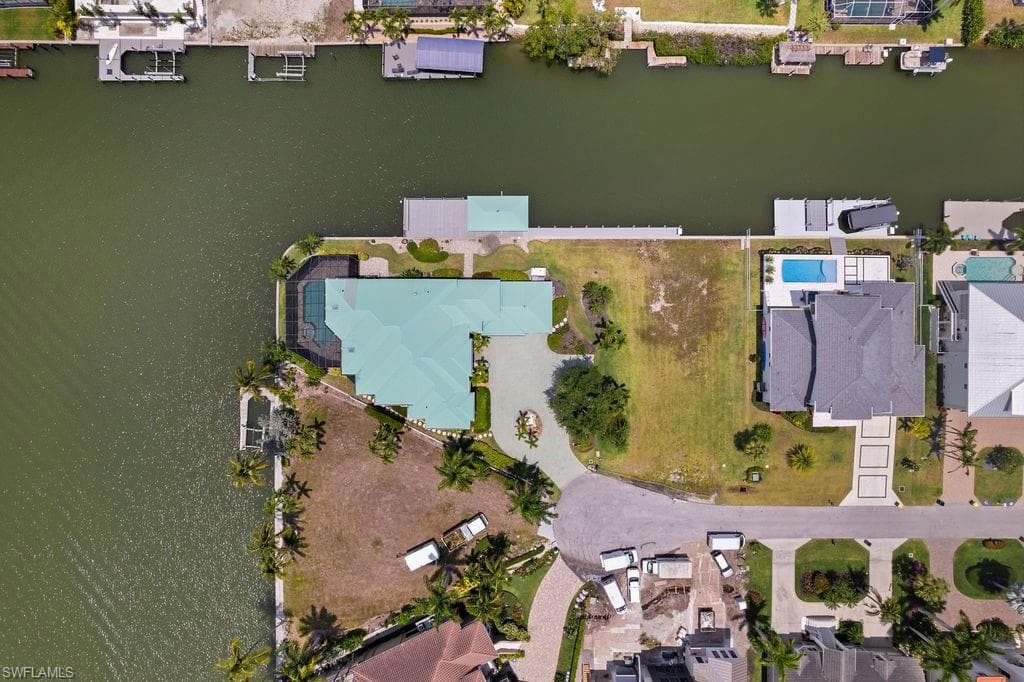 Aerial view of home and double lot