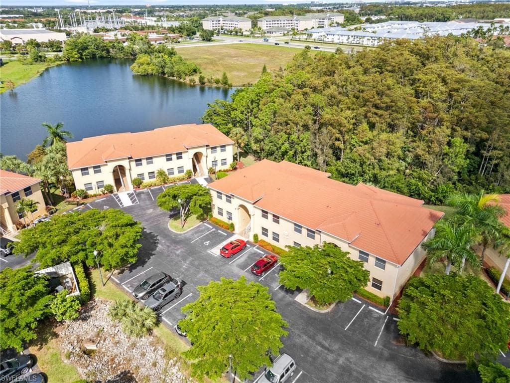 Bird's eye view of a large body of water and apartment complex
