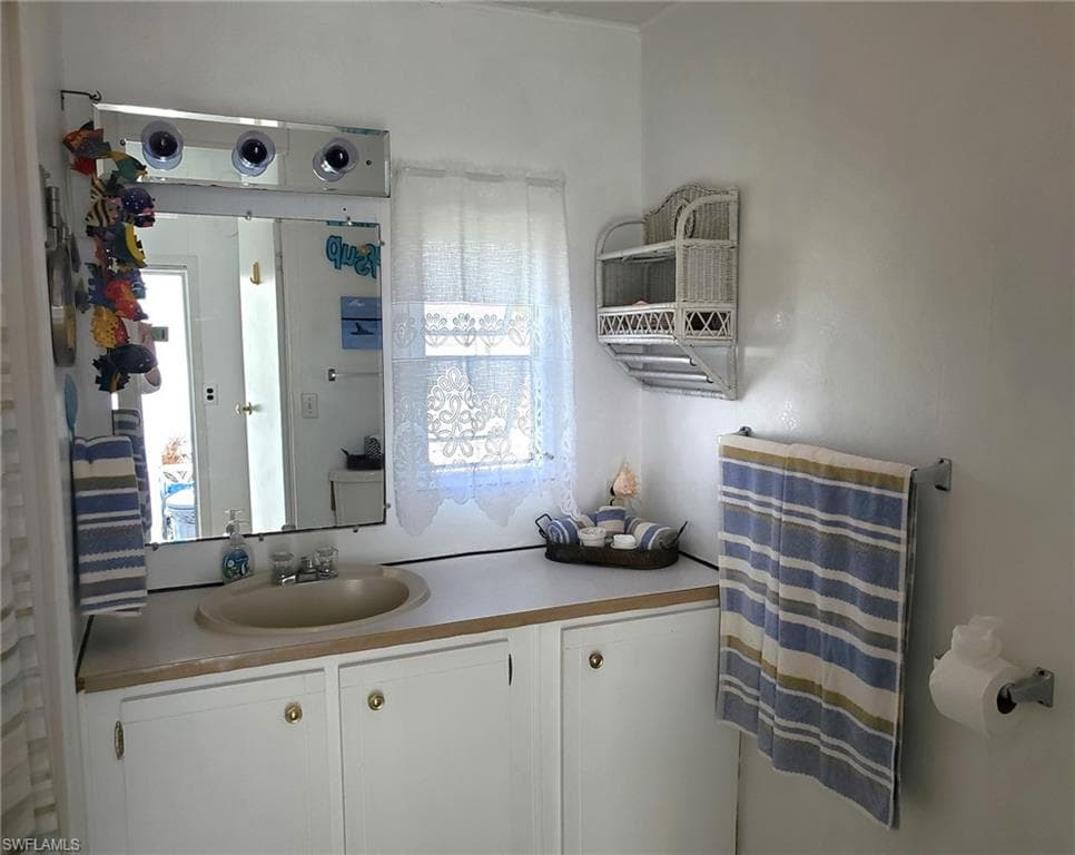 Bathroom with tub/shower combination.