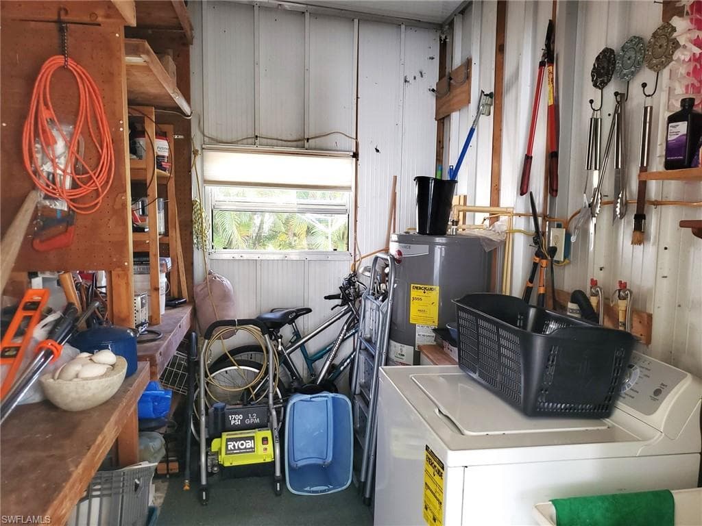 Washer and full-size Water Heater are located in the shed. (There is no dryer)