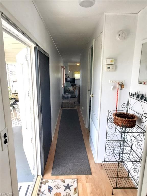 Side door leading to the backyard and carport