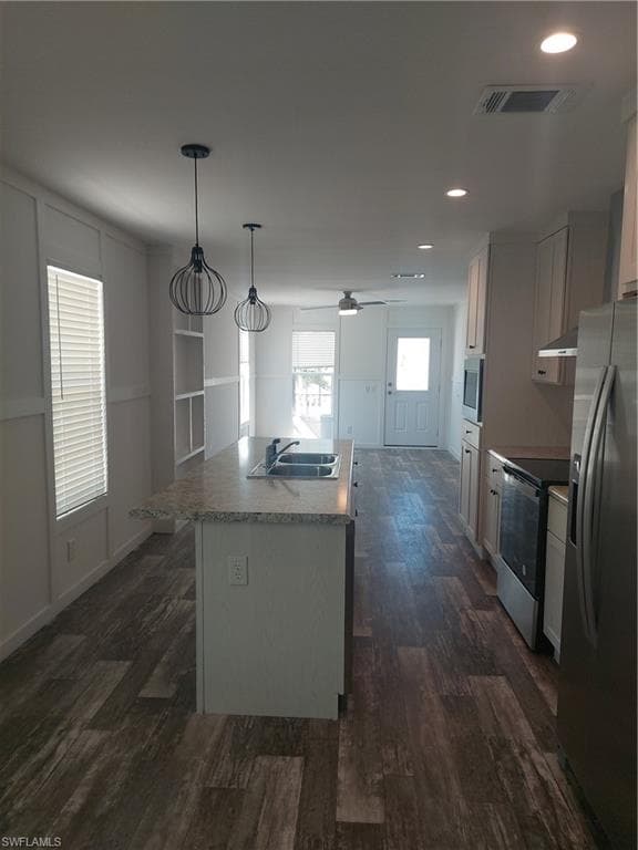 Galley Kitchen with plenty of cabinetry and Island