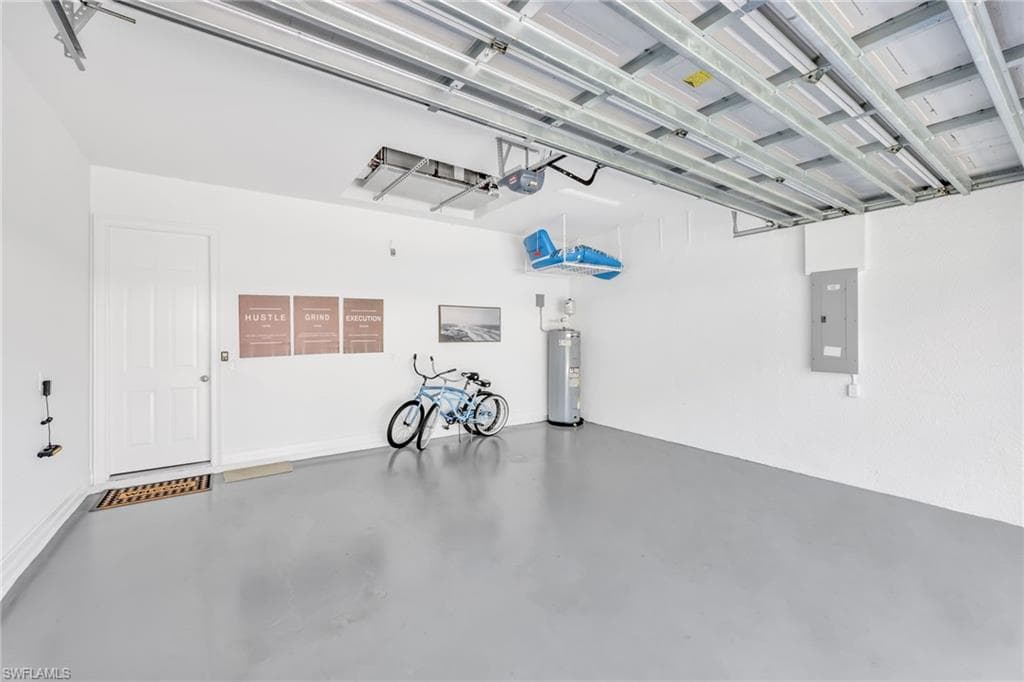 2 Car-Garage is clean as a whistle with painted flooring, walls and ceiling
