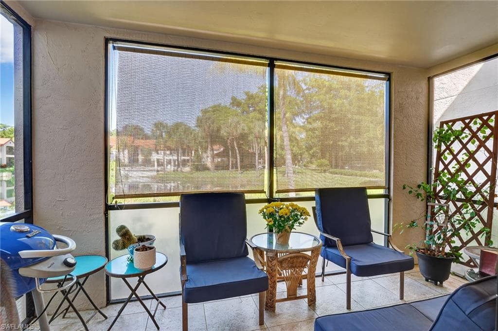 View of sunroom / Shades down
