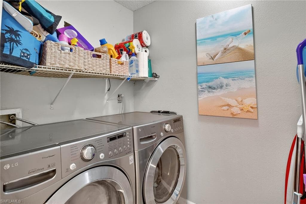Washroom featuring LG Stainless washer and dryer