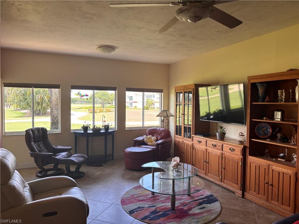 Spacious Living room. Lots of natural light and great view