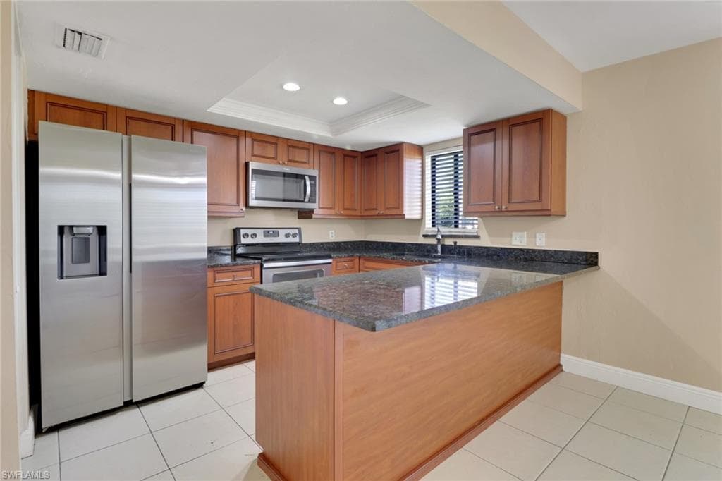 Nice granite kitchen and stainless appliances.