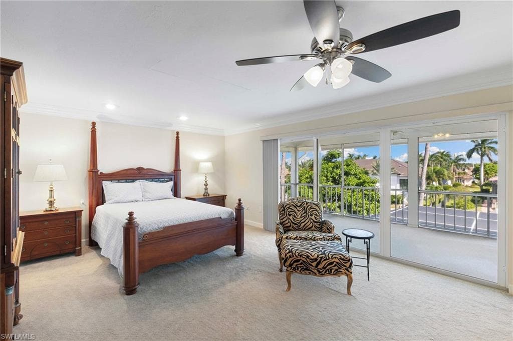 Virtually Staged - Bedroom with access to exterior, ornamental molding, light wood-style flooring, ceiling fan, and recessed lighting