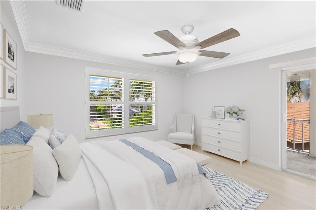 Virtually Staged - Bedroom with wood finished floors, ornamental molding, a ceiling fan, and access to exterior
