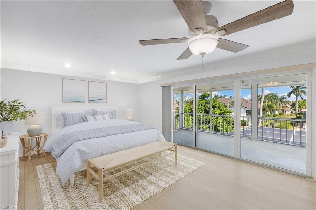 Virtually Staged - Bedroom with access to exterior, ornamental molding, light wood-style flooring, ceiling fan, and recessed lighting