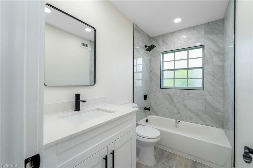 Empty room with light wood-style floors and baseboards