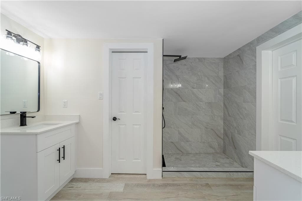 Empty room with light wood-type flooring and baseboards