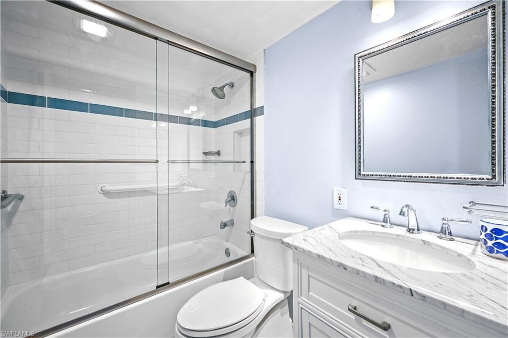 Fully renovated bathroom with beautiful tile and vanity.