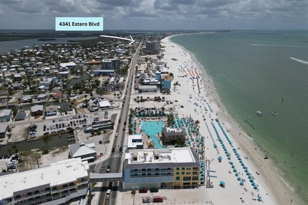 Aerial view of waterfront with a beach