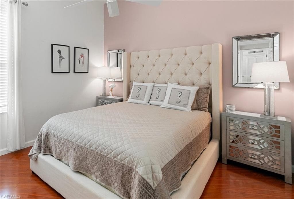 Bedroom featuring hardwood / wood-style flooring and ceiling fan
