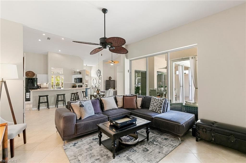 Tiled living room with ceiling fan