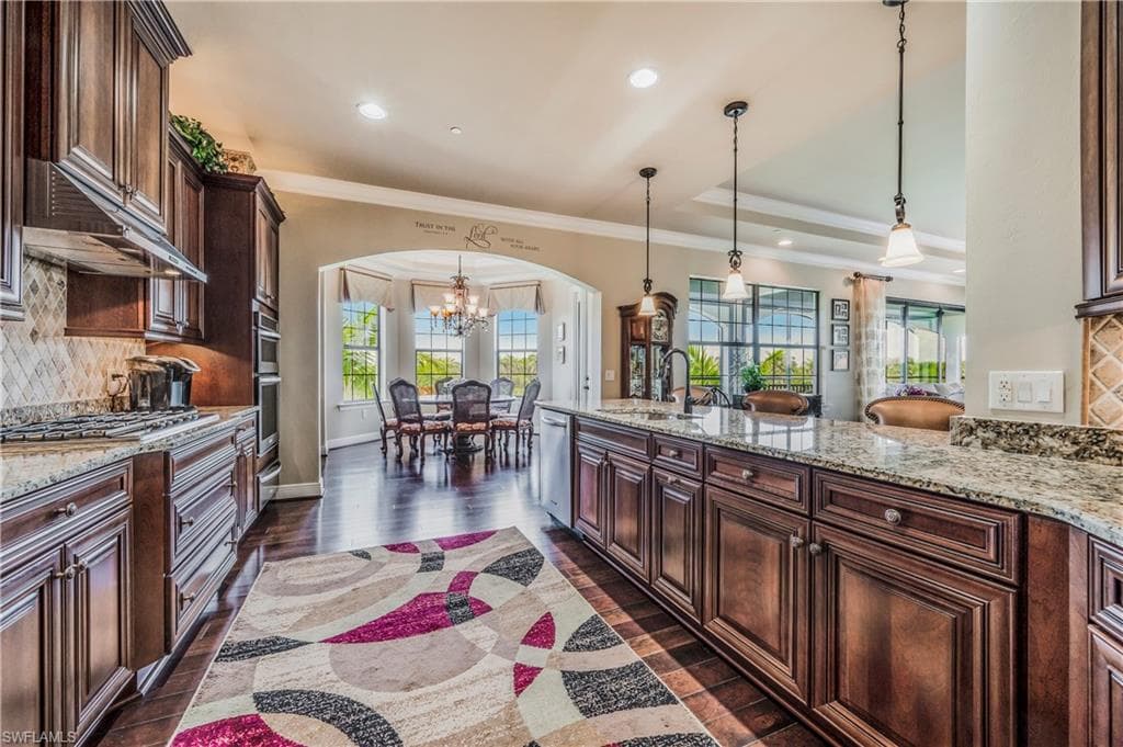 Separate breakfast area with a wall of windows.