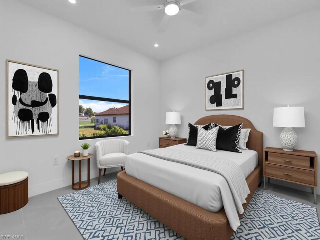 Bedroom with ceiling fan and recessed lighting