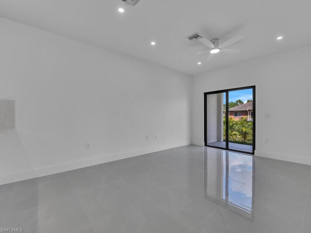 Unfurnished room featuring recessed lighting, a ceiling fan, and tile patterned floors