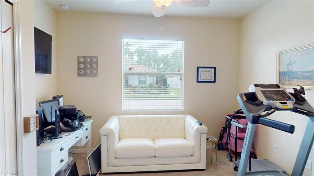 Bedroom 1 or Home office featuring a ceiling fan