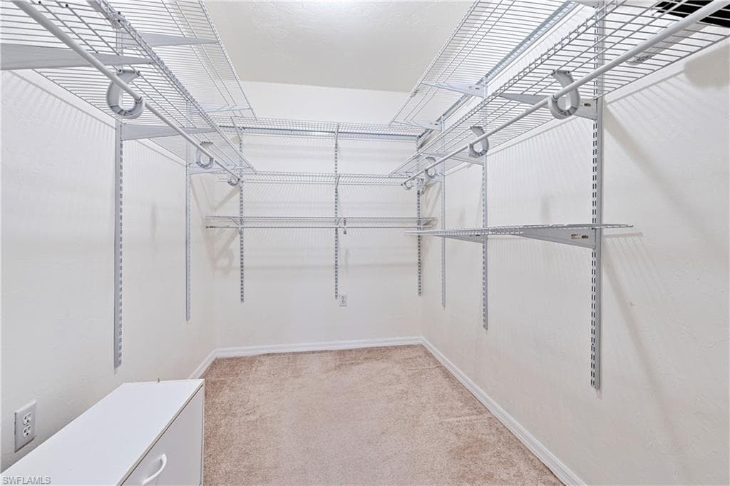 Large walk in closet in primary bedroom.