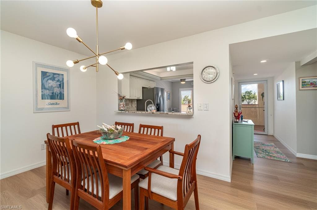 Dining area with pass-through window to kitchen