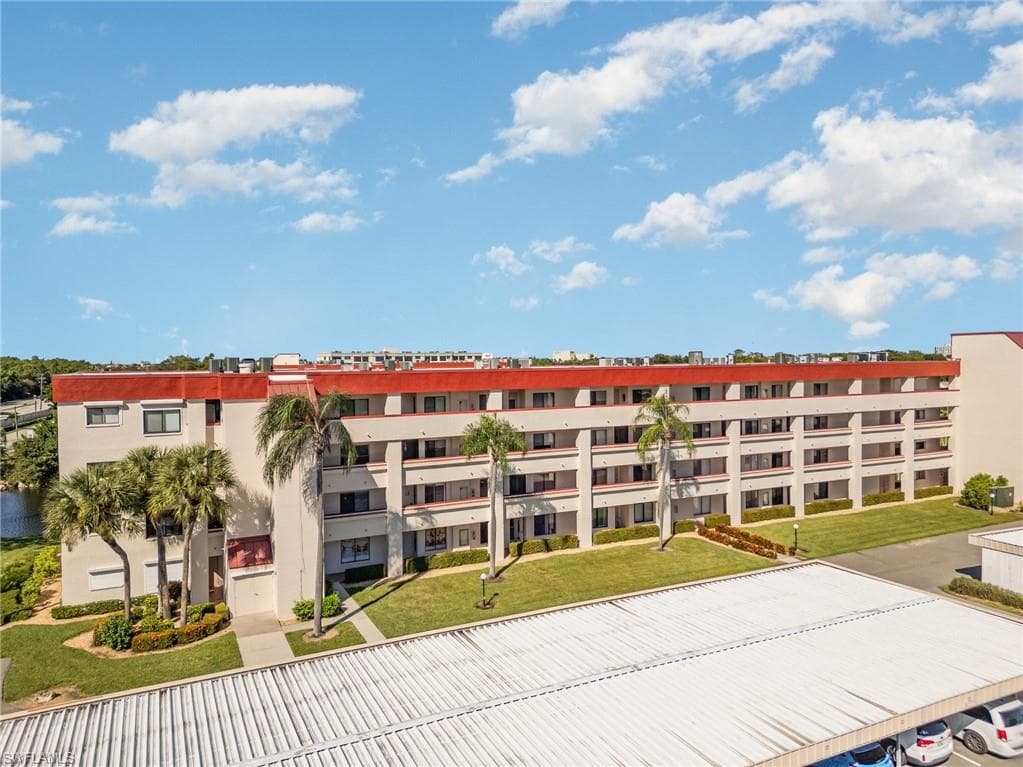 Front of the building with 1 carport space #7