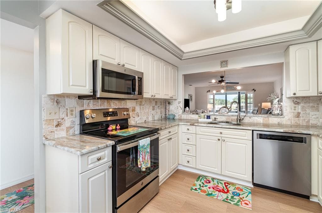 Kitchen with granite counters and stainless steel appliances