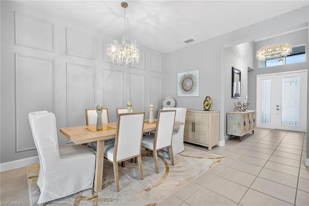 BEAUTIFUL decorative picture frame accent wall in dining area...