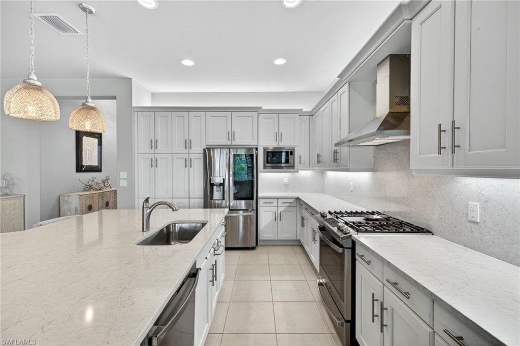 Elegance and gas cooking!!! Soft close drawers, microwave is air fryer and convection oven, too! Upgraded cabinets a huge plus!