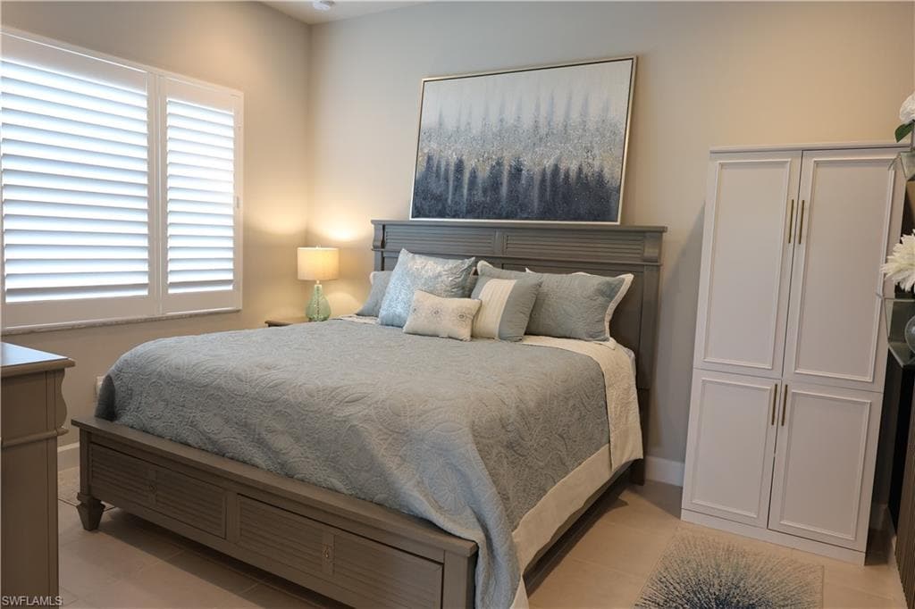3rd Bedroom or Den featuring large window and ceiling fan