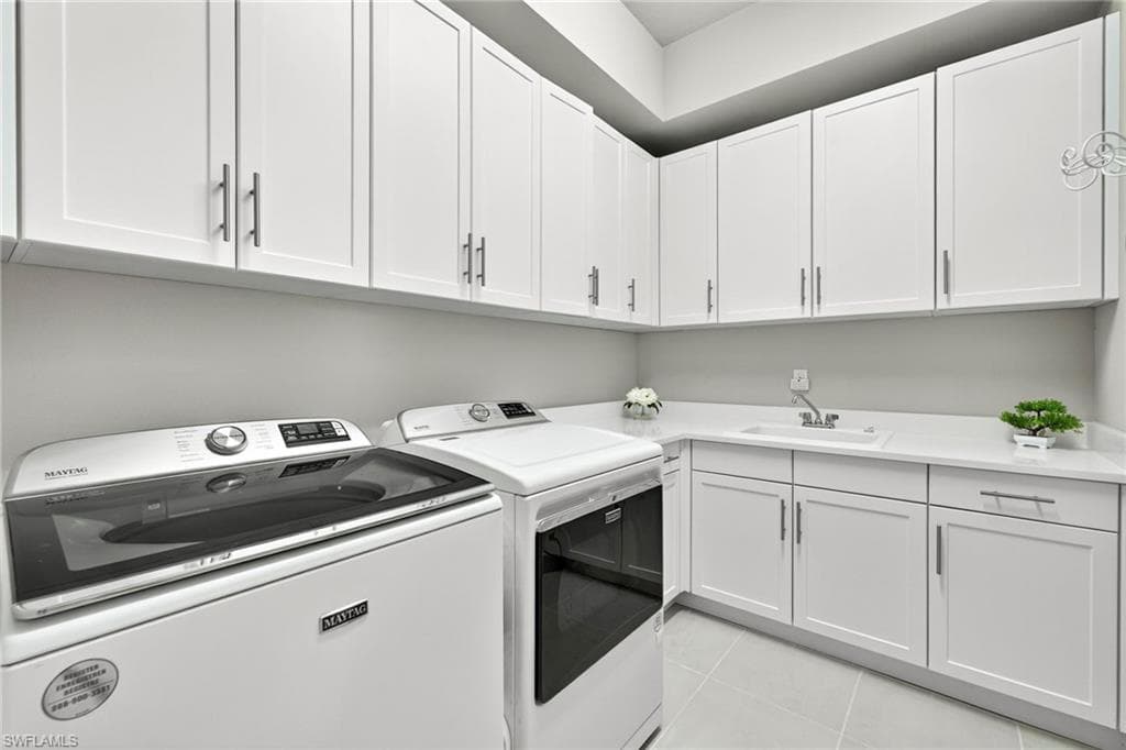 UPGRADED washer and dryer...plus a large utility tub and cabinets galore!!!