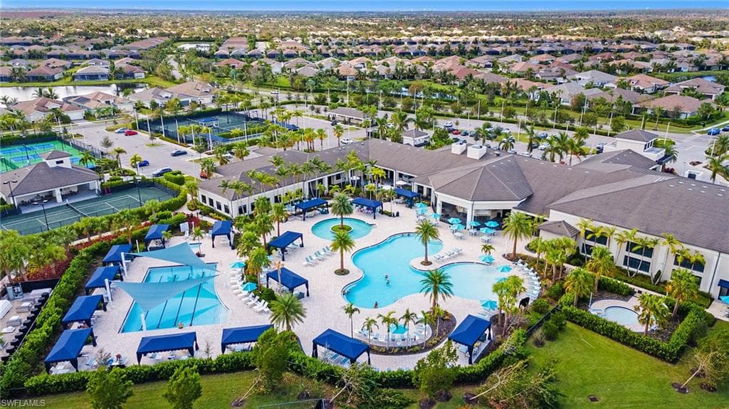 Aerial view of our community including 4 pools and sport courts!