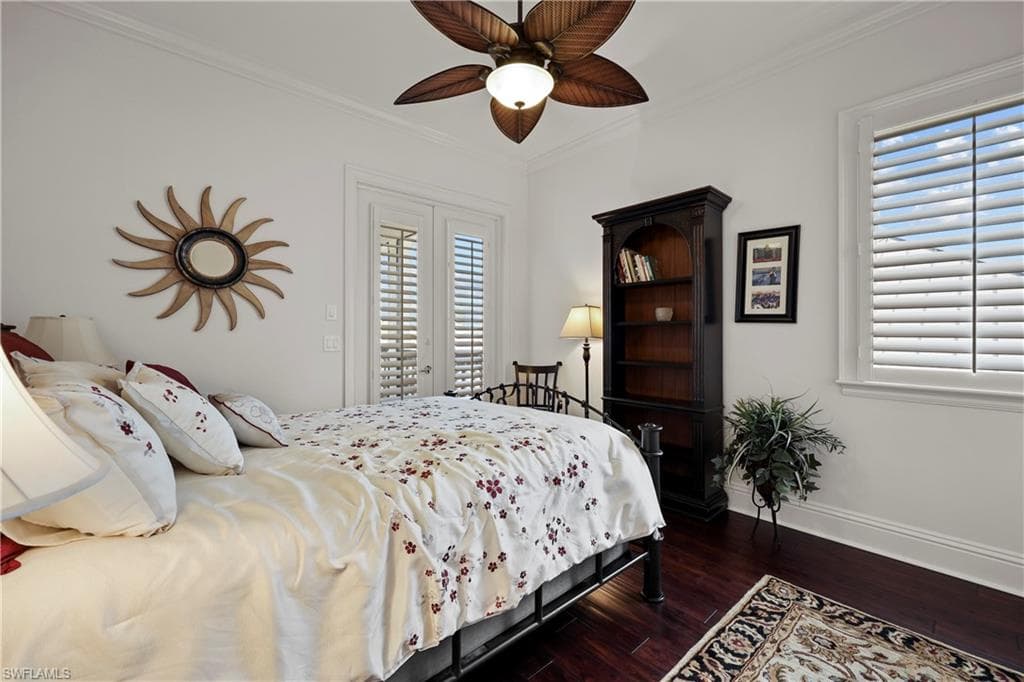Third floor Guest bedroom, French doors to balcony overlooking water