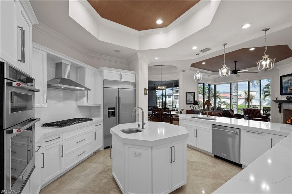 Like new updated kitchen, gas cooktop, KitchenAid Stainless appliances, Pompeii Quartz countertops and custom cabinets