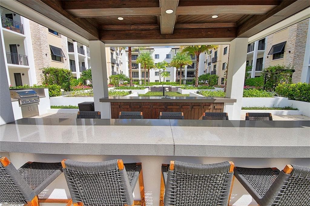 View of patio / terrace with exterior kitchen and outdoor dining area