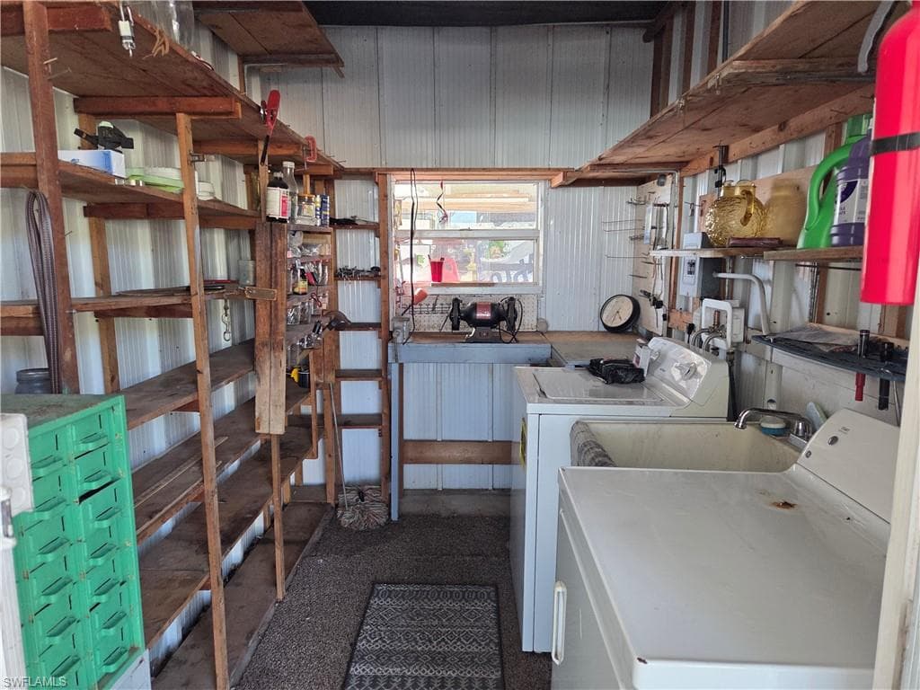 Washer, Dryer, & laundry tub are conveniently located in the breezeway shed.