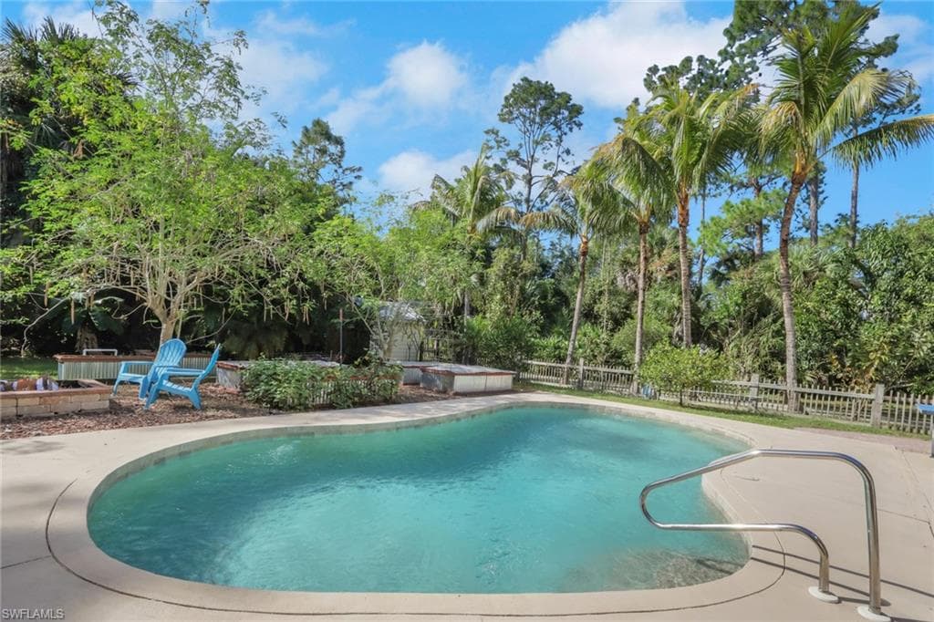Beautiful saltwater sports pool with a huge patio for seating, relaxing, and entertaining