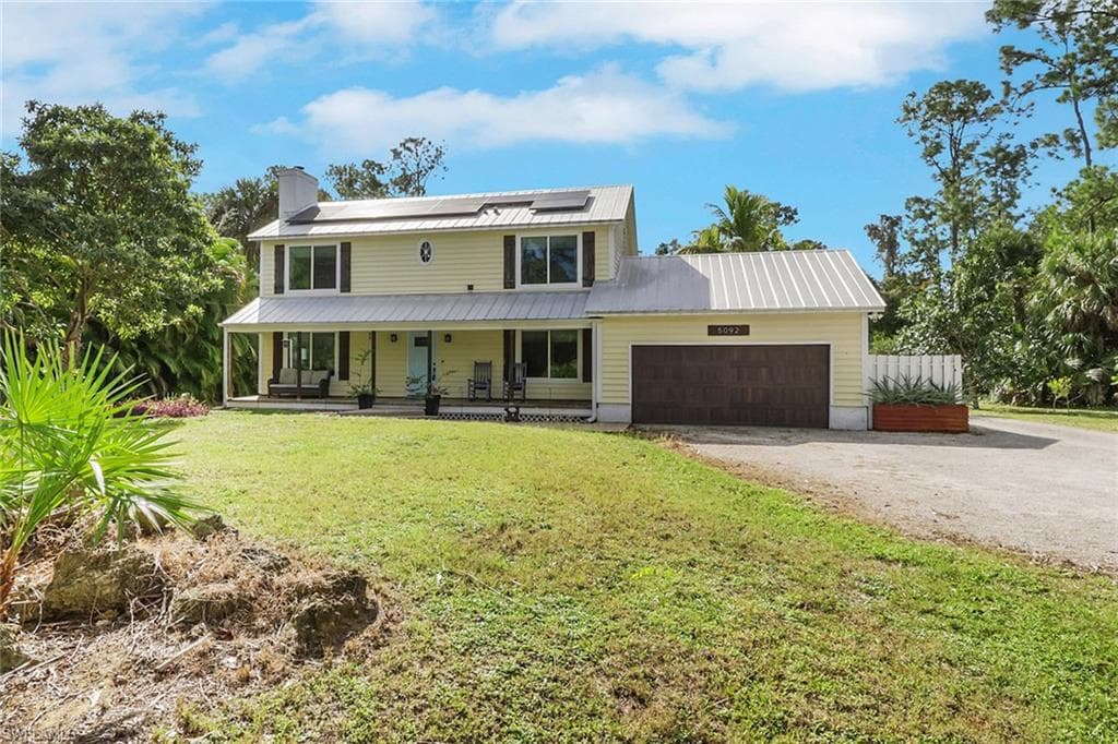 Beautiful two story home with a lovely porch along the front of the home, newer metal roof on all structures, brand new solar panels. This home has beautiful curb appeal and is one of a kind