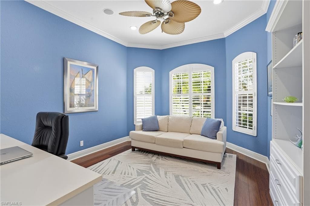 Office featuring crown molding, wood finished floors, a ceiling fan, and recessed lighting