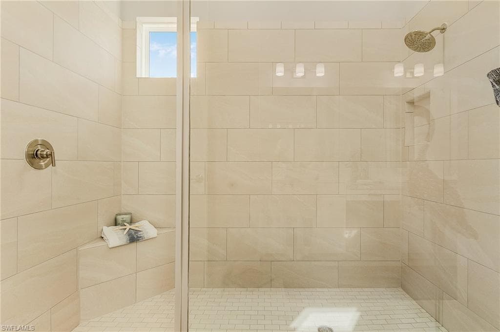 Bathroom with upgraded tile shower