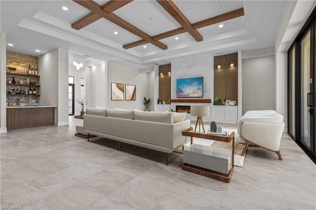 Community lobby with beam ceiling, coffered ceiling, and recessed lighting