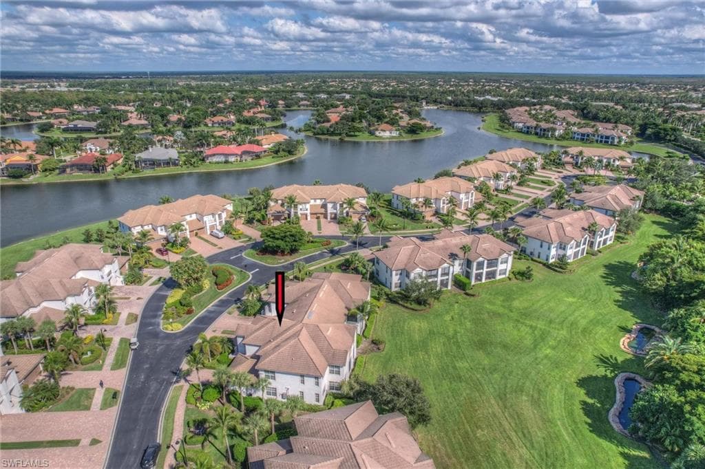 View of property location with nearby suburban area and a large body of water